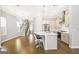 Open kitchen with a large island, stainless steel appliances, and seamless flow to the living space at 1058 Kirkland Cir, Smyrna, GA 30080