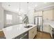 Bright, modern kitchen with stainless steel appliances and hardwood flooring at 1058 Kirkland Cir, Smyrna, GA 30080