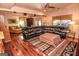 Spacious basement featuring a large leather sectional and recessed lighting at 350 Ridgemont Dr, Fayetteville, GA 30215