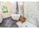 Modern bathroom with soaking tub, walk-in shower, and stylish vanity at 350 Ridgemont Dr, Fayetteville, GA 30215