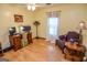 Spacious bedroom with hardwood floors, ample natural light, and ceiling fan at 350 Ridgemont Dr, Fayetteville, GA 30215