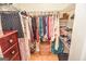 Walk-in closet with built-in storage and hanging racks for clothing at 350 Ridgemont Dr, Fayetteville, GA 30215