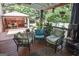 Relaxing covered patio with comfortable seating, ideal for outdoor entertaining at 350 Ridgemont Dr, Fayetteville, GA 30215