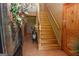 Inviting view from a doorway leading to a staircase with a wooden banister and steps at 350 Ridgemont Dr, Fayetteville, GA 30215
