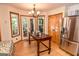 Kitchen and breakfast area showcasing wooden island and stainless steel appliances at 350 Ridgemont Dr, Fayetteville, GA 30215
