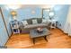 Cozy living room with comfortable seating, stylish decor, and hardwood floors at 350 Ridgemont Dr, Fayetteville, GA 30215