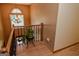 Stairwell with a chandelier and view from a large window at 350 Ridgemont Dr, Fayetteville, GA 30215