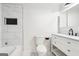 Stylish bathroom with a shower featuring white tile, and a modern vanity with marble countertop at 6072 Holiday Blvd, Forest Park, GA 30297