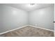 Clean bedroom with carpet and overhead lighting at 6072 Holiday Blvd, Forest Park, GA 30297
