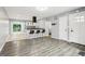 Kitchen featuring a breakfast bar, modern appliances, and an open concept design at 6072 Holiday Blvd, Forest Park, GA 30297