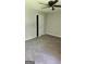 Bedroom with carpet, closet, ceiling fan, and natural light at 6120 Raleigh Oaks Ct, Lithonia, GA 30058