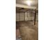 Spacious garage featuring multiple white garage doors and ample room for parking or storage at 6120 Raleigh Oaks Ct, Lithonia, GA 30058