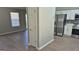 Open living space with hardwood floors, connecting to the kitchen and offering a versatile layout for modern living at 6120 Raleigh Oaks Ct, Lithonia, GA 30058