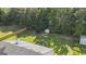 A large backyard featuring a shed, trampoline, and a fire pit at 1108 The By Way, Mcdonough, GA 30252