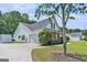 Rear exterior view of home showing backyard and attached garage at 1108 The By Way, Mcdonough, GA 30252