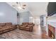 Spacious living room with vaulted ceilings, hardwood floors, and a fireplace at 1108 The By Way, Mcdonough, GA 30252