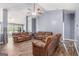 Spacious living room with vaulted ceilings, hardwood floors, and ample seating at 1108 The By Way, Mcdonough, GA 30252