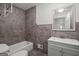 Modern bathroom featuring stylish tile work, a bathtub, and contemporary fixtures at 416 S Carroll Rd, Villa Rica, GA 30180