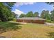 Home exterior with large backyard, and patio at 416 S Carroll Rd, Villa Rica, GA 30180