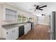 Functional kitchen with white cabinets, modern appliances, and ample counter space at 416 S Carroll Rd, Villa Rica, GA 30180