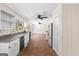 Open kitchen layout featuring stainless steel appliances and plenty of cabinet storage at 416 S Carroll Rd, Villa Rica, GA 30180
