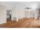 Spacious living room with hardwood floors and neutral paint, providing a bright and airy space at 416 S Carroll Rd, Villa Rica, GA 30180