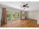 Bright living room featuring hardwood floors and large windows, creating a warm and inviting atmosphere at 416 S Carroll Rd, Villa Rica, GA 30180