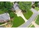Lovely home featuring mature landscaping, a cozy outdoor fireplace, and inviting curb appeal at 750 Highview Ct, Woodstock, GA 30189