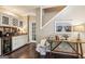 Entertainment area with a wine rack, countertop, hardwood floors, and a beverage cooler at 750 Highview Ct, Woodstock, GA 30189
