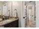 Bathroom featuring granite countertops, tile floors, and decorative fixtures at 750 Highview Ct, Woodstock, GA 30189