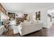 Inviting living room with stone fireplace, built-in shelves, and a comfortable sofa, perfect for relaxation at 750 Highview Ct, Woodstock, GA 30189