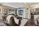 Inviting living room with hardwood floors, a large TV, and a comfortable leather sofa at 750 Highview Ct, Woodstock, GA 30189