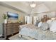Comfortable main bedroom with ample dresser storage, soft colors, and a relaxing atmosphere at 750 Highview Ct, Woodstock, GA 30189