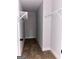 Walk-in closet with neutral carpeting and shelving for storage and organization at 1705 Lake Dow Rd, Mcdonough, GA 30252