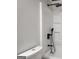 Modern bathroom features new showerhead and white shower walls at 5180 Ash St, Forest Park, GA 30297