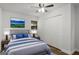 Comfortable bedroom features a ceiling fan, closet and neutral walls at 5180 Ash St, Forest Park, GA 30297