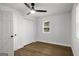 Bedroom with wood flooring, closet and natural light at 5180 Ash St, Forest Park, GA 30297