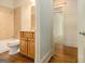 Bathroom featuring a bathtub and vanity with storage at 115 Edgewood Pkwy, Fayetteville, GA 30215
