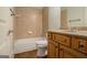 Bathroom featuring a bathtub and vanity with storage at 115 Edgewood Pkwy, Fayetteville, GA 30215