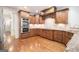 Kitchen with stainless steel appliances, granite countertops, and custom cabinetry at 115 Edgewood Pkwy, Fayetteville, GA 30215