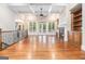 Spacious living room featuring a stone fireplace and custom built-ins at 115 Edgewood Pkwy, Fayetteville, GA 30215