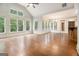 Spacious living room with lots of natural light from the large windows overlooking green scenery at 115 Edgewood Pkwy, Fayetteville, GA 30215