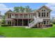 Spacious outdoor deck and walkout basement offer ample space for entertaining at 115 Edgewood Pkwy, Fayetteville, GA 30215