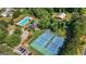 Great aerial view of community amenities including pool, tennis courts, green space and parking at 3007 Brush Arbor Xing, Mcdonough, GA 30252