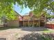 Multi-level backyard featuring wooden decks and a covered patio with outdoor seating at 3007 Brush Arbor Xing, Mcdonough, GA 30252