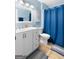 Light and airy bathroom featuring a white vanity and blue accents at 3007 Brush Arbor Xing, Mcdonough, GA 30252