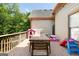 Wooden deck with toys and outdoor dining set, perfect for Gathering gatherings at 3007 Brush Arbor Xing, Mcdonough, GA 30252