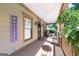 Relaxing covered porch featuring a seating area, string lights, and a welcoming atmosphere at 3007 Brush Arbor Xing, Mcdonough, GA 30252