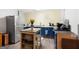 This charming kitchen has blue cabinets, stainless steel appliances, and an island at 3007 Brush Arbor Xing, Mcdonough, GA 30252