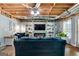 Comfortable living room with built-ins, fireplace, and exposed ceiling at 3007 Brush Arbor Xing, Mcdonough, GA 30252